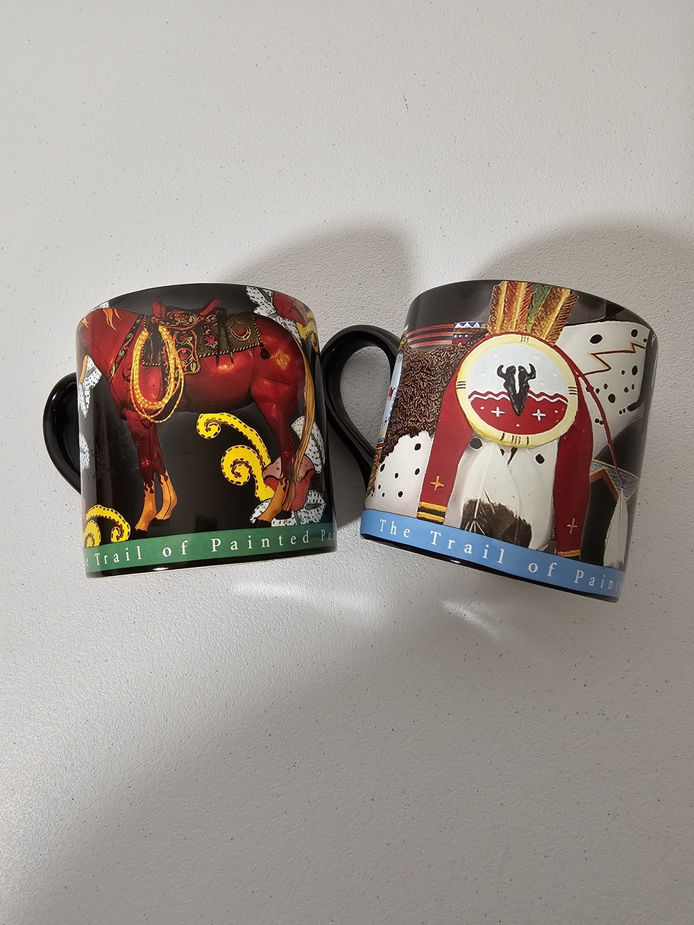 The Trail Of Painted Ponies Mugs